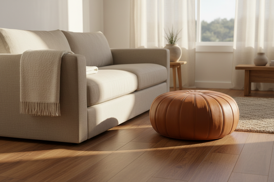 Styled interior shot 1 - tan leather pouf in cozy living room