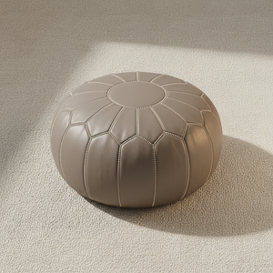 Flat lay of grey Moroccan leather pouf