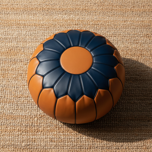 Flat lay of Moroccan pouf on linen rug