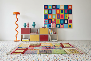 Patchwork rug in Memphis terrazzo living room