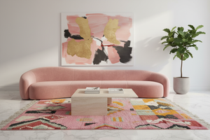 Pink rug in blush sculptural living room