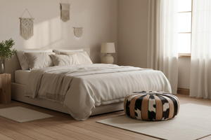 Pouf at the foot of a bed
