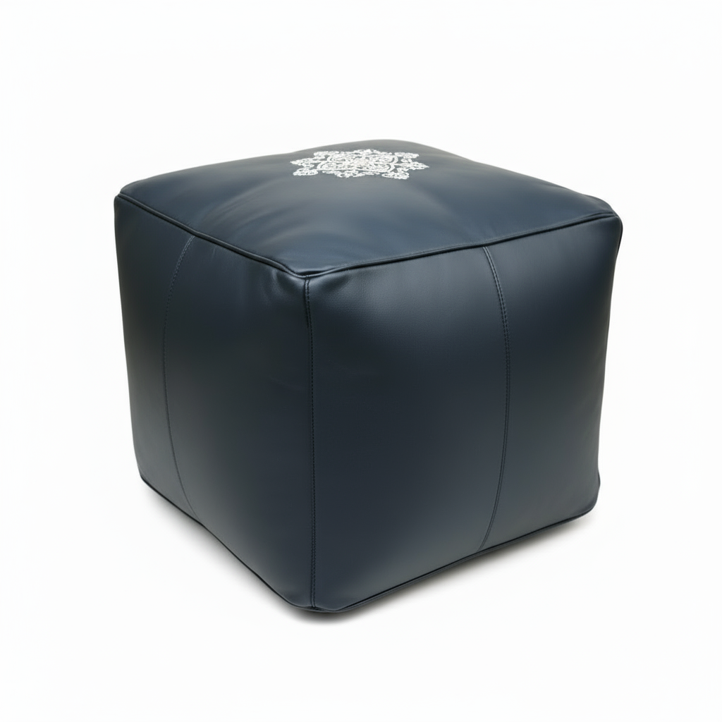 Professional studio shot of navy blue ottoman pouf