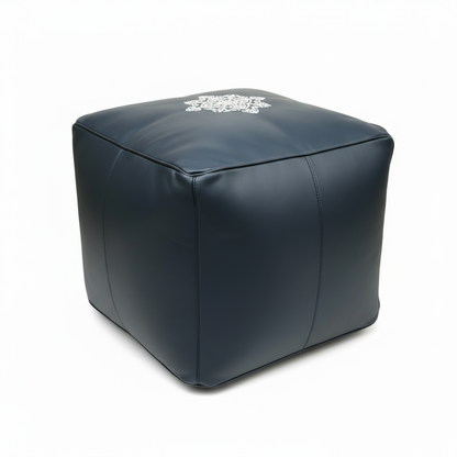 Professional studio shot of navy blue ottoman pouf