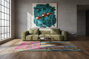 Striped rug in Edra olive Tom Dixon living room