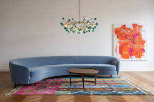 Striped rug in Moooi periwinkle evening living room