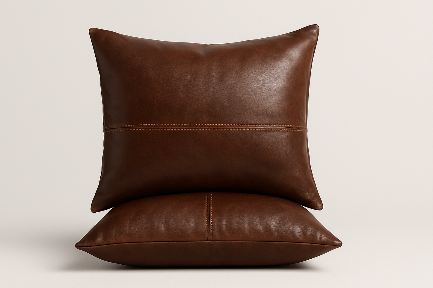 Studio shot of square Moroccan leather pillows with clean design
